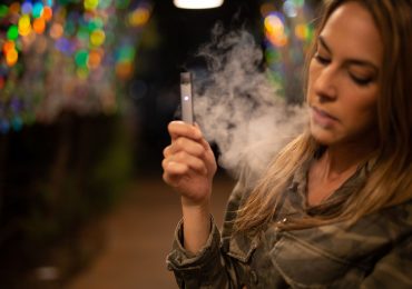 Girl Using Organic Vape Juice